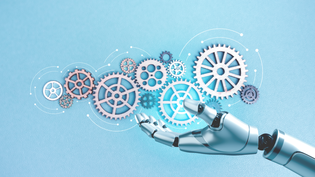 Reskilling employees: a robotic hand reaching towards a cluster of wooden cogs on a pale blue background