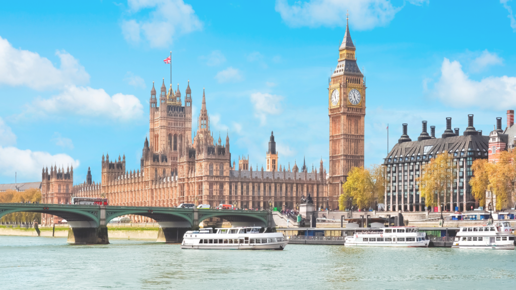 The Fair Work Agency: the Houses of Parliament and Big Ben across the River Thames, with Westminster Bridge and riverboats in the foreground